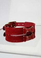 RED PEBBLE EMBOSSED LEATHER WITH ENAMEL BOW